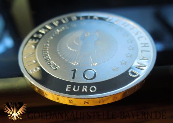 10 € Bundesrepublik Deutschland, 2012 Gedenkmünze in 625 Silber. 50 Jahre deutsche Welthungerhilfe.